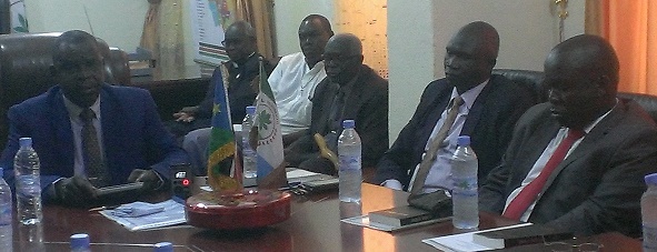 The front threefrom right to left Denis Lasuba Yei commissioner deputy governor Kiri Gwolo and Governor David Lokonga during the swearing in